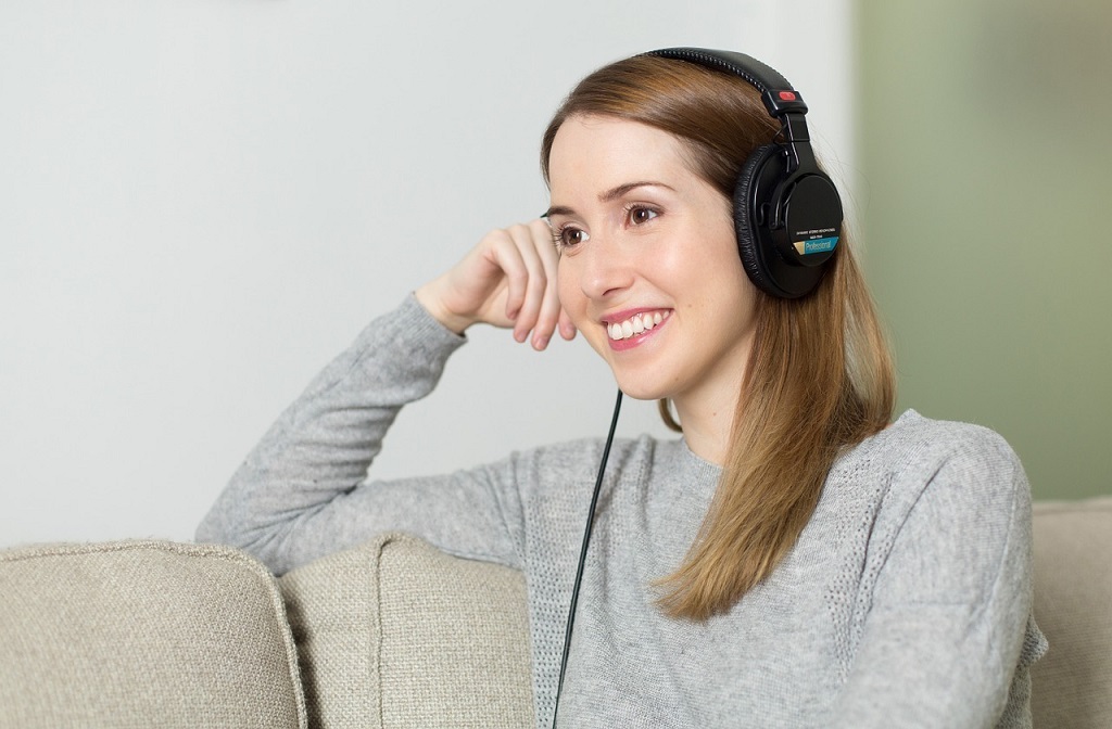 Is it permissible for anyone to wear a headset while driving