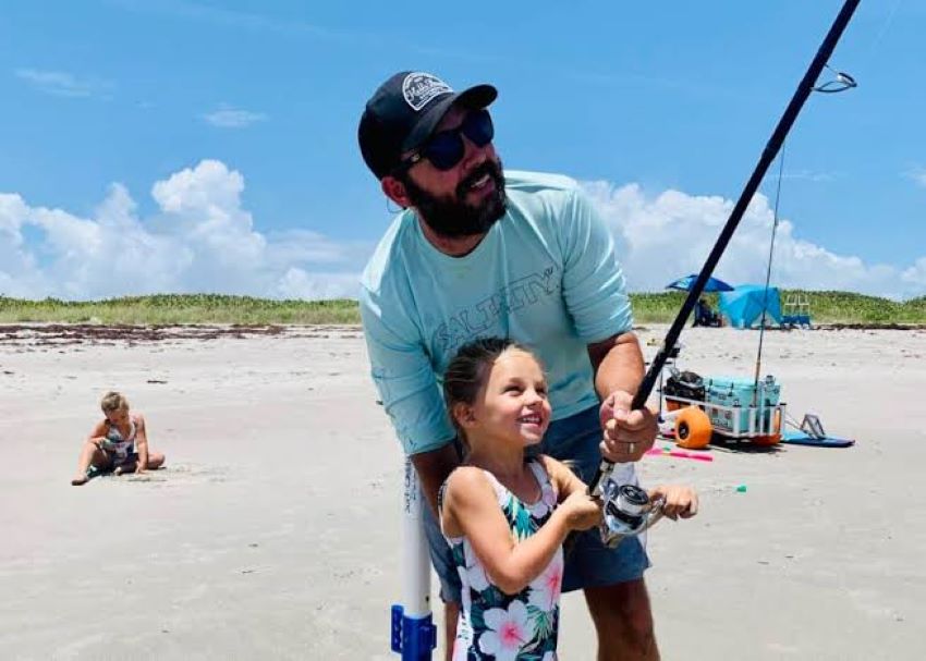Child learning to fish with a beginner-friendly rod and reel set